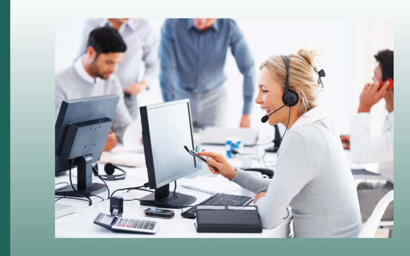 woman smiling with headset and laptop